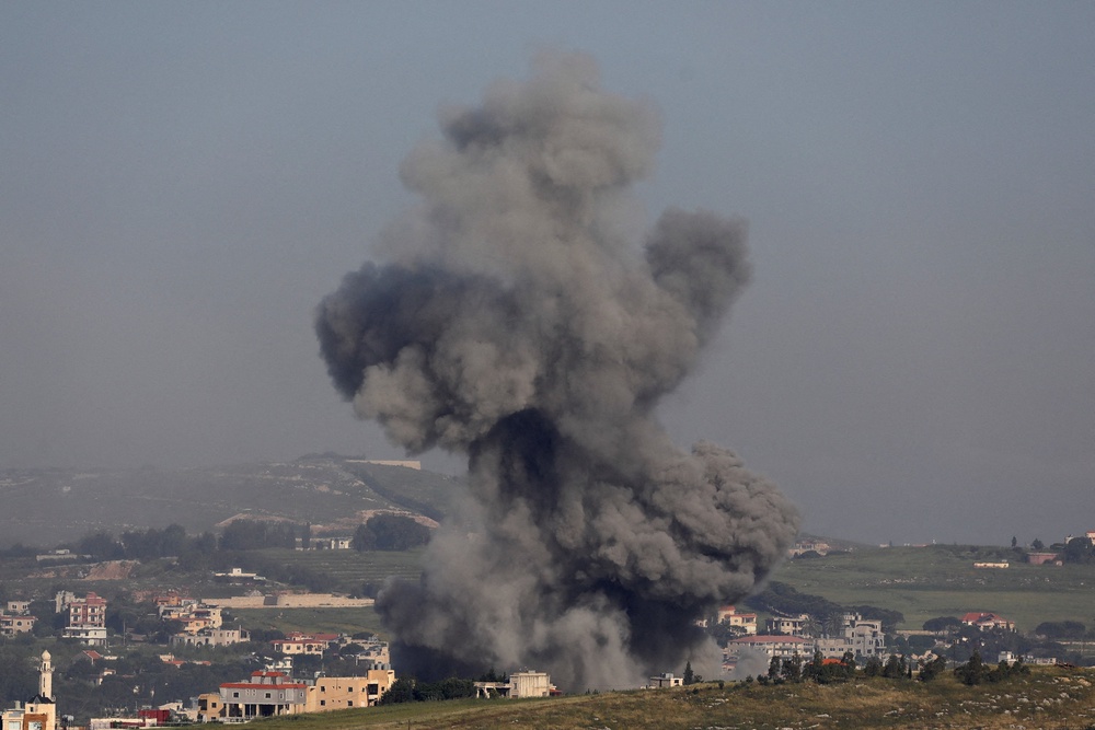 Smoke rises following an Israeli strike in southern Lebanon as seen from Marjayoun, May 11 (Reuters)