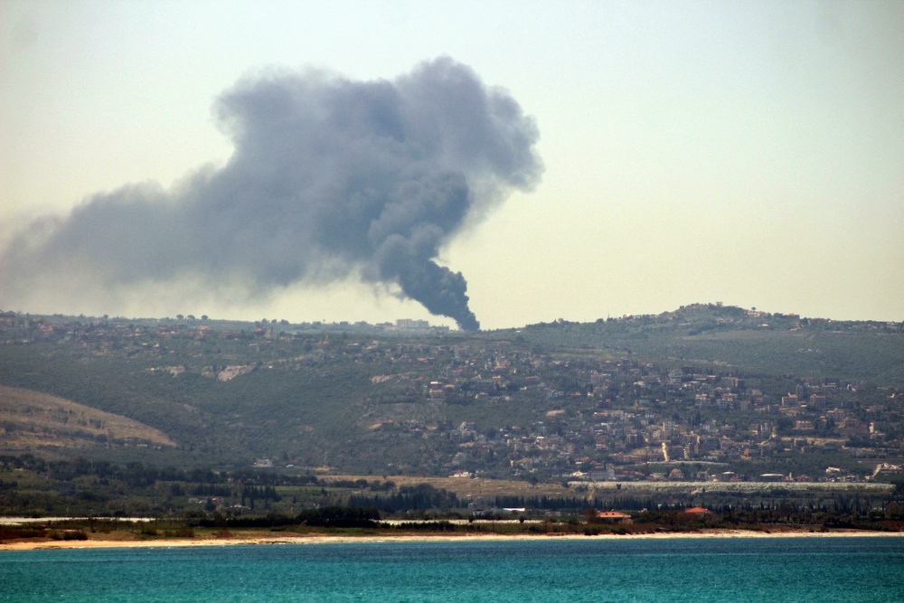 Smoke rises from the site of an Israeli bombardment in the village of Tair Harfa in Lebanon on Monday (AFP/Getty)