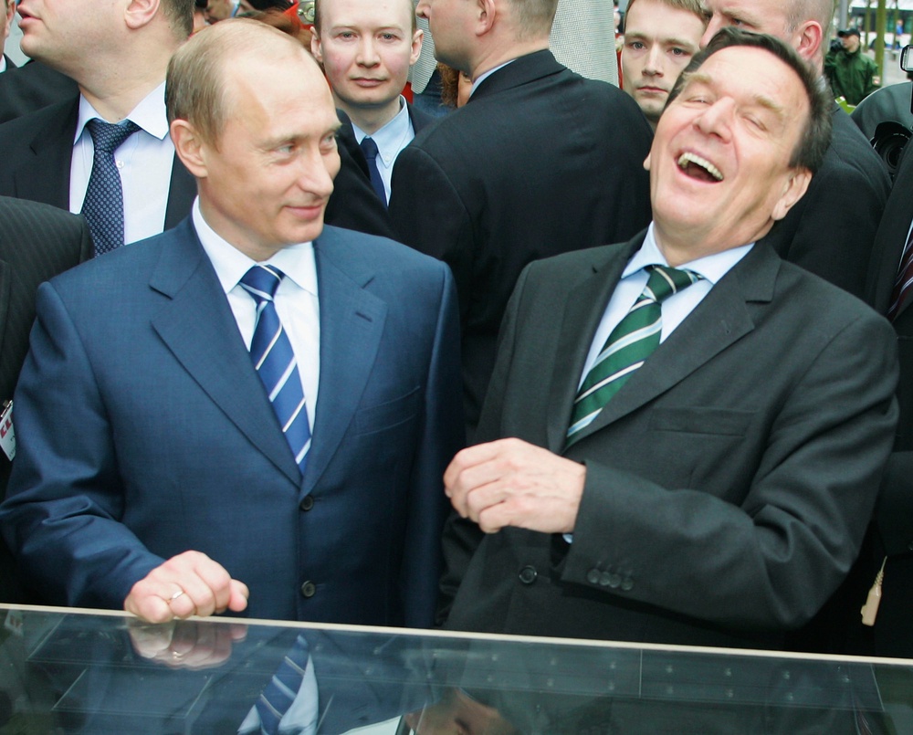 Putin and Schroeder at the opening of the Hanover Fair in 2005 (Getty)