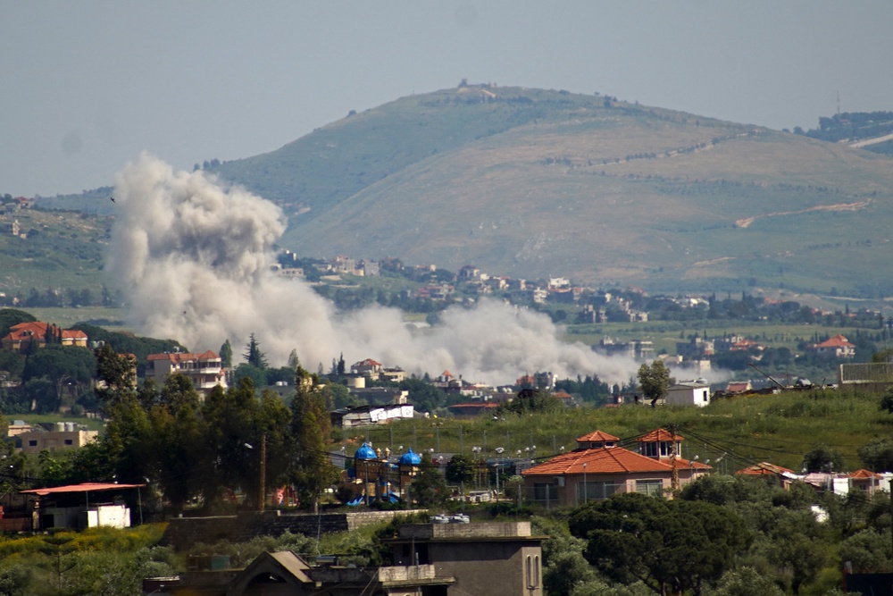 This photograph taken from the southern Lebanese area of Nabatieh shows smoke rising from the site of an Israeli airstrike that targeted the village of Kfar Tibnit (AFP/Getty)