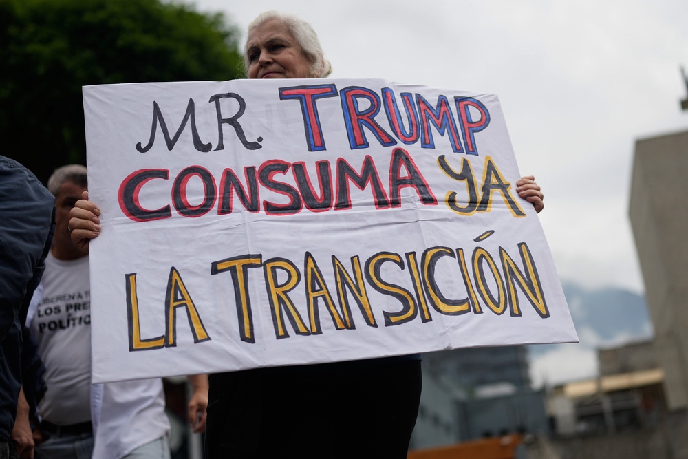 Protesters in Caracas called on Trump to ‘complete the transition now’ in demonstrations demanding democratic elections after Maduro’s arrest (AP)