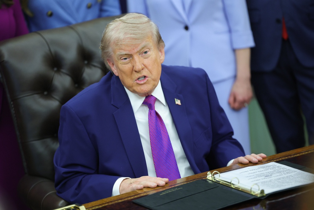 WASHINGTON, DC - MAY 11:  U.S. President Donald Trump answers a question from a reporter during an event on maternal healthcare in the Oval Office of the White House (Getty)