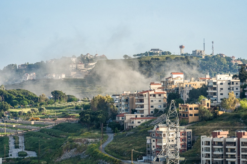 Smoke rises following Israeli bombardment in the district of Nabatieh in southern Lebanon on 10 May (AFP/Getty)