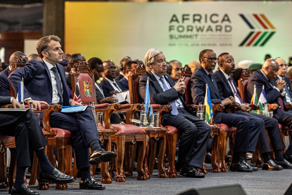 French president Emmanuel Macron sits with UN secretary-general Antonio Guterres (centre), Rwanda’s president Paul Kagame, Ethiopian prime minister Abiy Ahmed and Lesotho’s King Letsie III at the Africa Forward Summit in Nairobi on Tuesday 12 May (AFP/Getty)