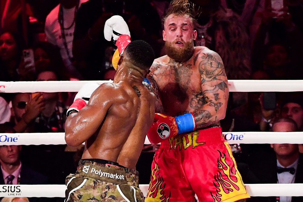 Jake Paul, right, was knocked out by Anthony Joshua in December (JC Ruiz/PA) (PA Media)
