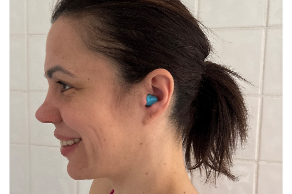 These swimming earplugs are designed to be worn over the ear canal, not inside it (Zoe Griffin/The Independent)