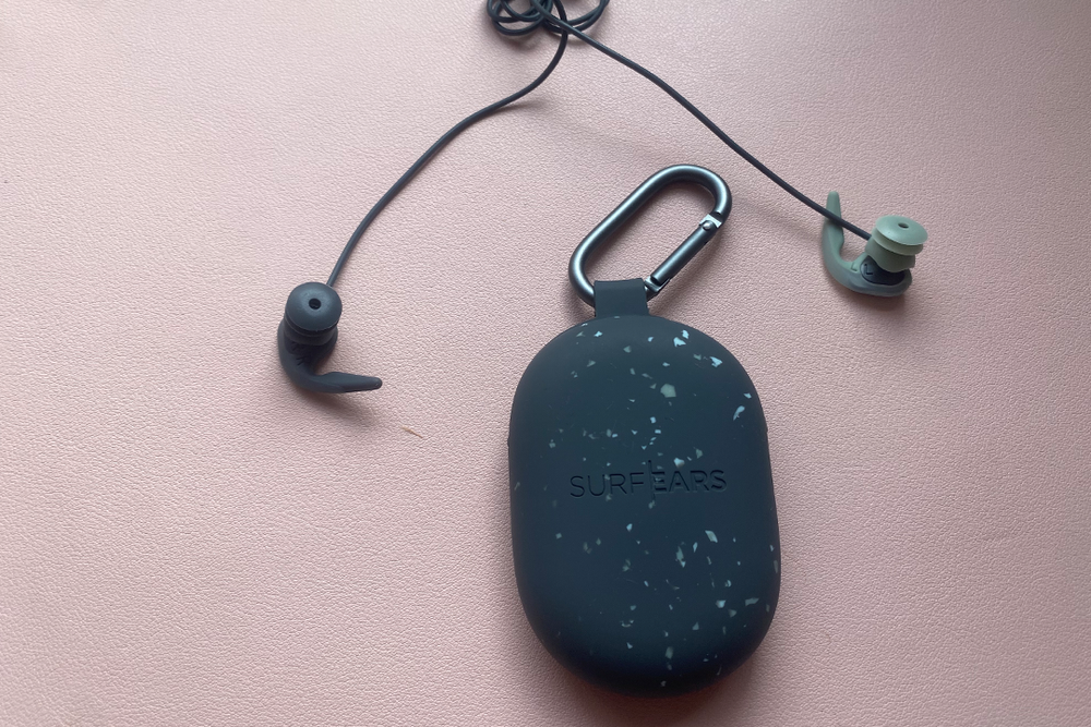 The carry case has a carabiner attachment so you can clip it to the outside of a swim bag (Zoe Griffin/The Independent)