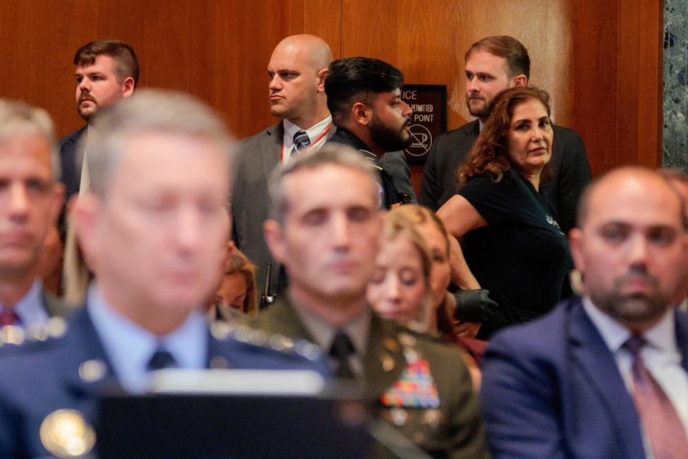 Capitol security removed a protester from the Senate Appropriations Subcommittee on Defense hearing (Getty Images)