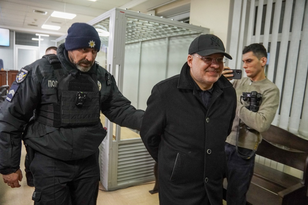 Former Energy Minister Herman Galushchenko (C) leaves after a court hearing over his detention (AFP/Getty)