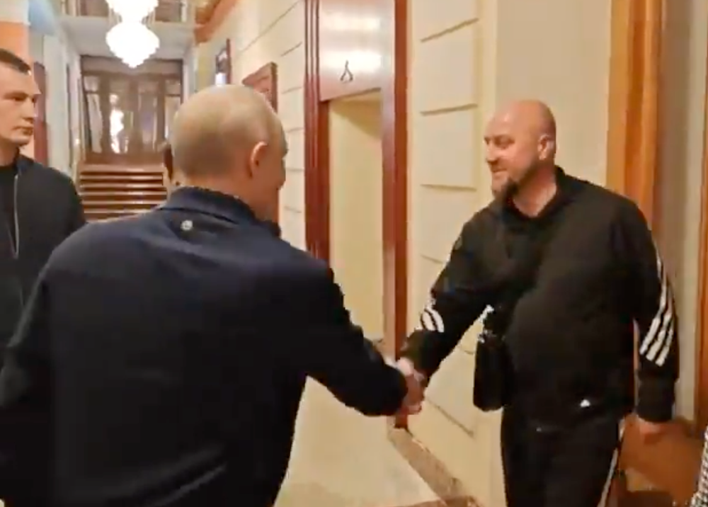 Putin shook hands with the man during an apparent chance encounter in a Moscow hotel lobby (kremlin.ru)