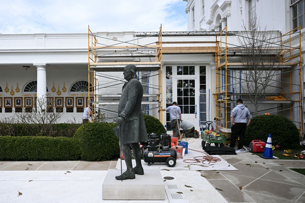 The garden will feature ‘historical figures’ of great importance, according to the National Endowment for the Humanities. A statue of Benjamin Franklin is seen here outside the West Wing (AFP via Getty Images)