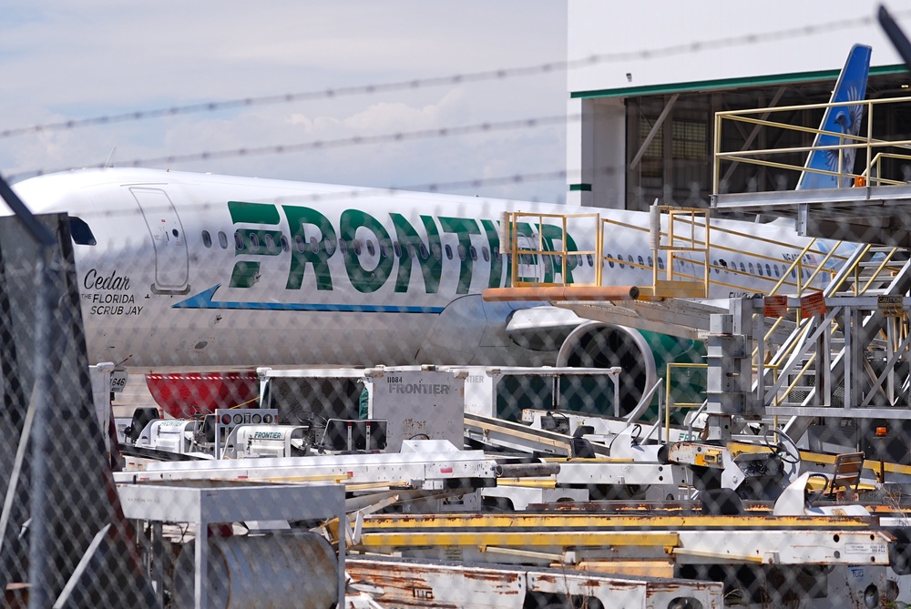 Surveillance video captured the harrowing moment the man was pulled into an aircraft engine, which instantly erupted in flames (AP Photo/David Zalubowski)