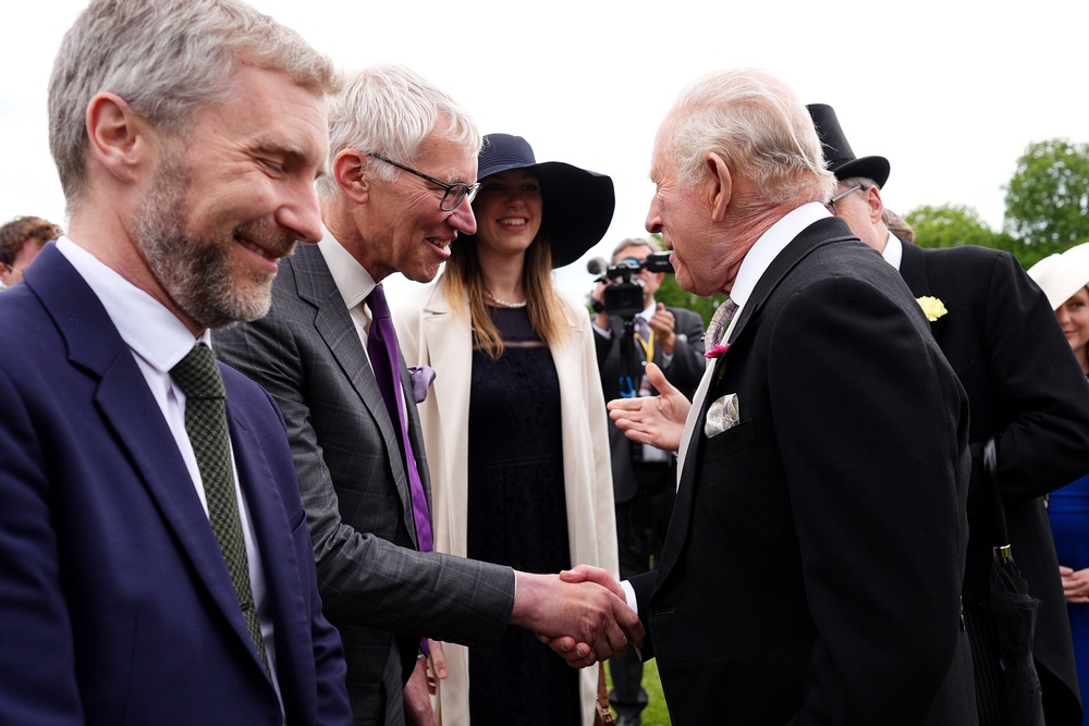 Charles speaks to The Rest Is History podcast host Tom Holland (Aaron Chown/PA) (PA Wire)