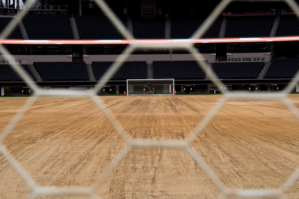 Construction, landscape, grass and engineering crews were applauded by local World Cup organizers and community ambassador Magic Johnson, who pointed out his suite where he will be watching. (Associated Press)