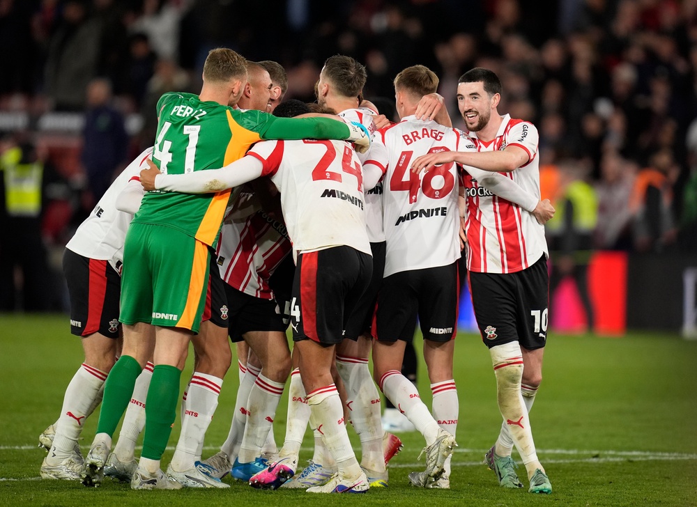 Southampton’s players celebrate at full time (Andrew Matthews/PA)
