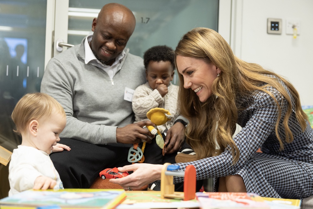 Kate plays with 13-month-old Amelia Baddeley on a charity visit (Geoff Pugh/Daily Telegraph/PA) (PA Wire)