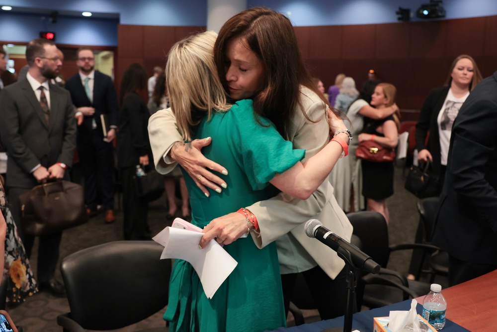 The witness was comforted by fellow abuse survivor Dani Hannah Bensky after delivering her testimony (Getty)
