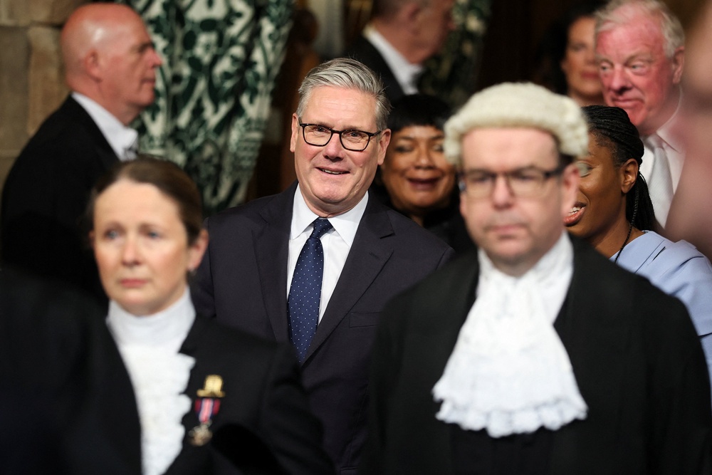 This year’s speech comes as Keir Starmer faces down nearly 100 of his own MPs who are calling for him to step down (Reuters)