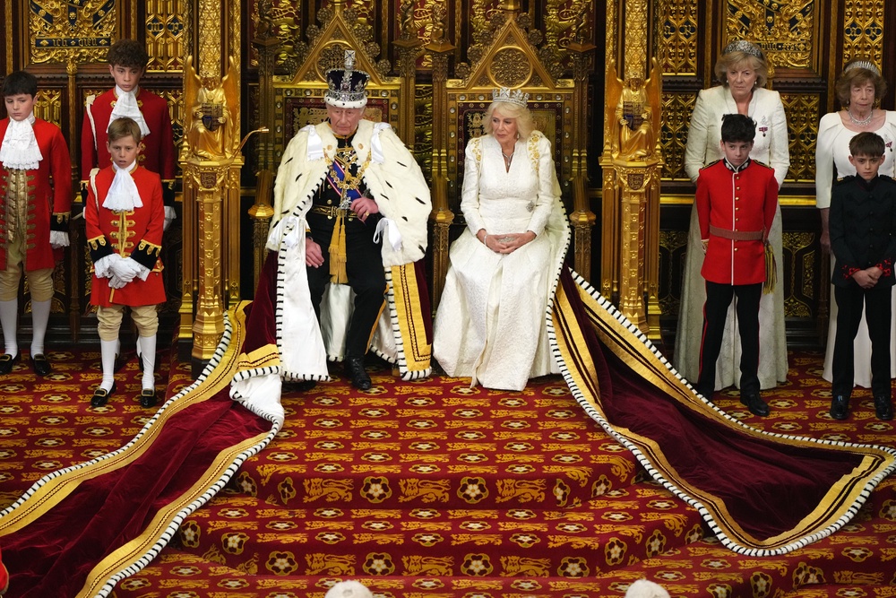 Charles, wearing the Imperial State Crown and the Robe of State, alongside Camilla in the Chamber of the House of Lords (Kirsty Wigglesworth/PA) (PA Wire)