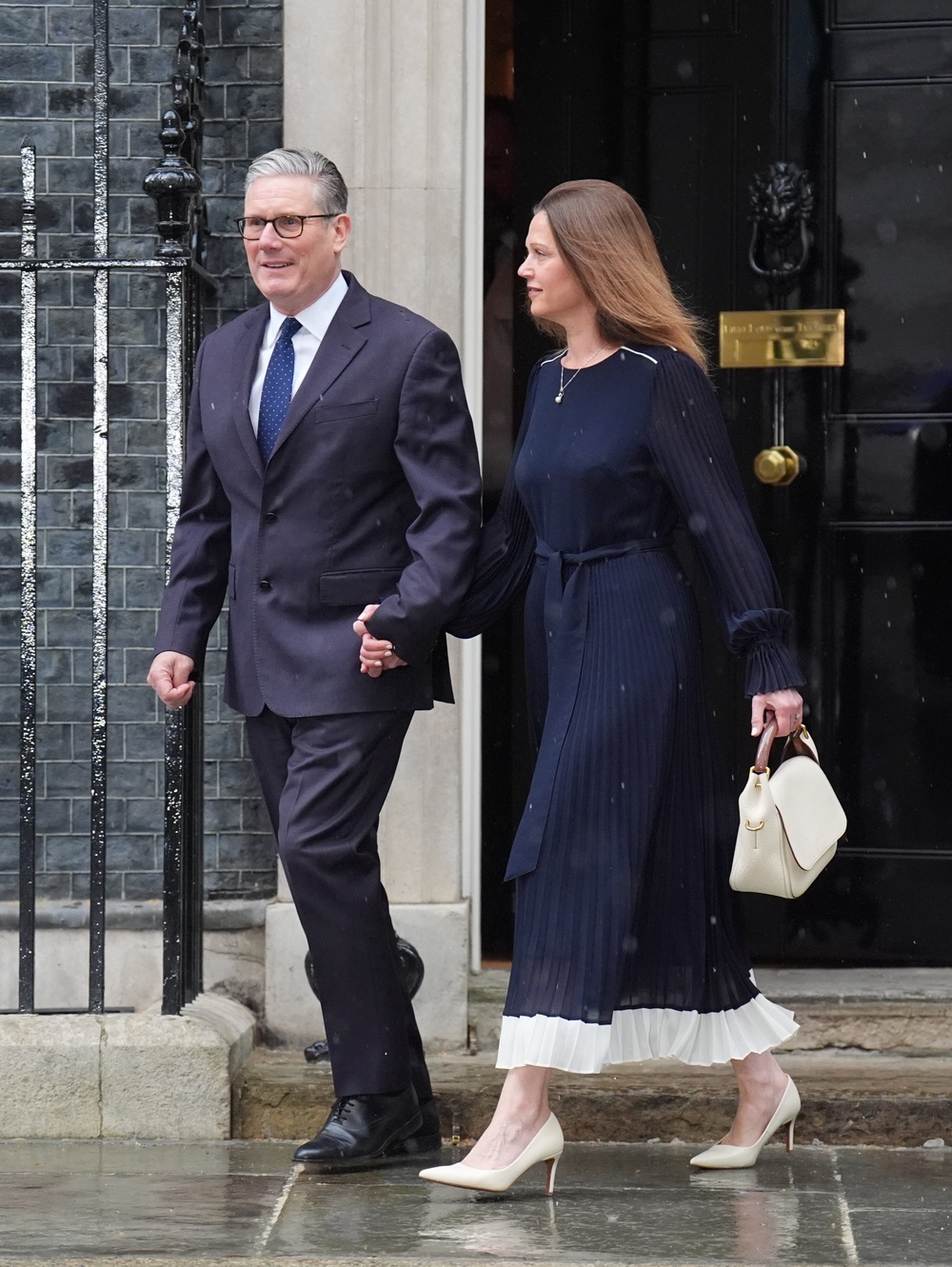 Prime Minister Sir Keir Starmer and Lady Victoria Starmer head out of number 10 Downing Street (James Manning/PA) (PA Wire)