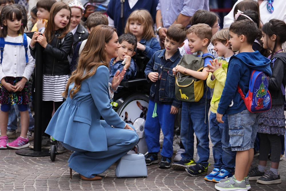 The princess chats with youngsters at the town hall (PA)