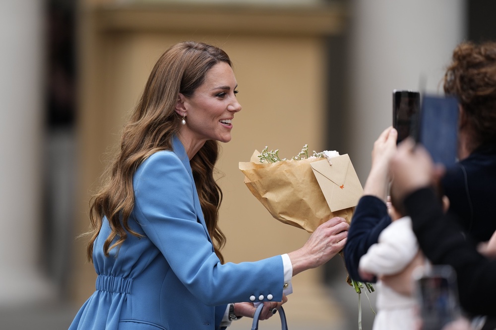 The princess receives a bouquet from a wellwisher (Jordan Pettitt/PA) (PA Wire)