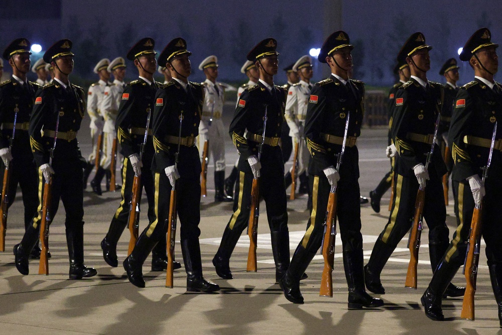 Members of a Military Honor Guard prepare for the arrival of U.S. President Donald Trump (Getty)
