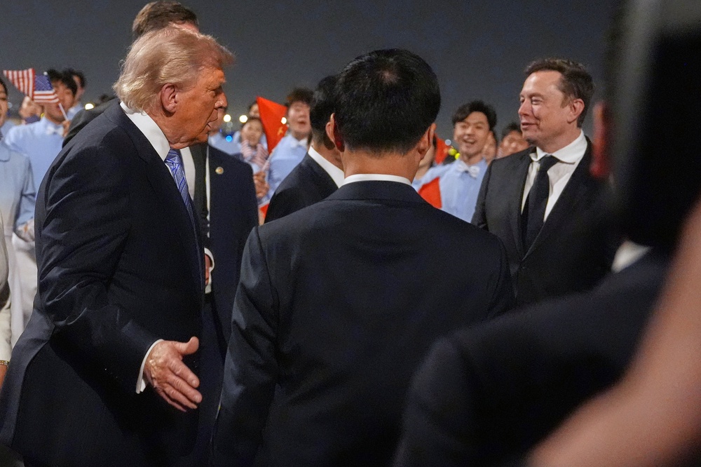 Musk travelled with the president on Air Force One (AP)