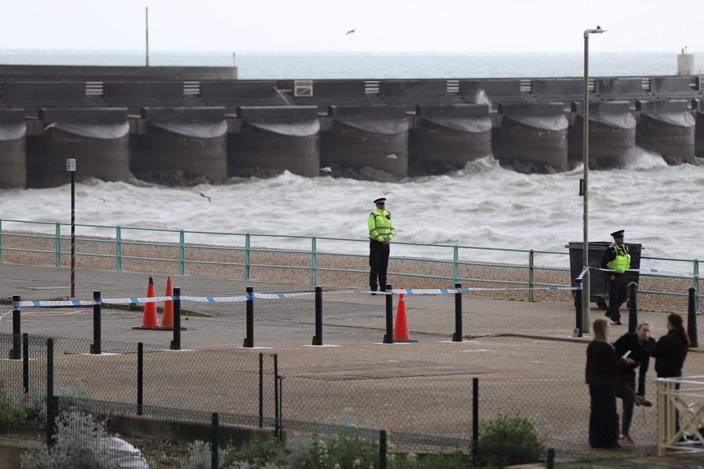 Police guard the beach after three bodies were found (Getty)