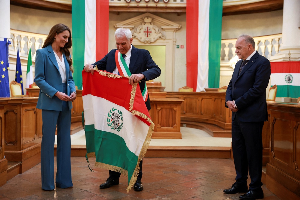 The Princess of Wales is presented with the Primo Tricolore award by Reggio Emilia mayor Marco Massari as she visits the town hall (Phil Noble/PA) (PA Wire)