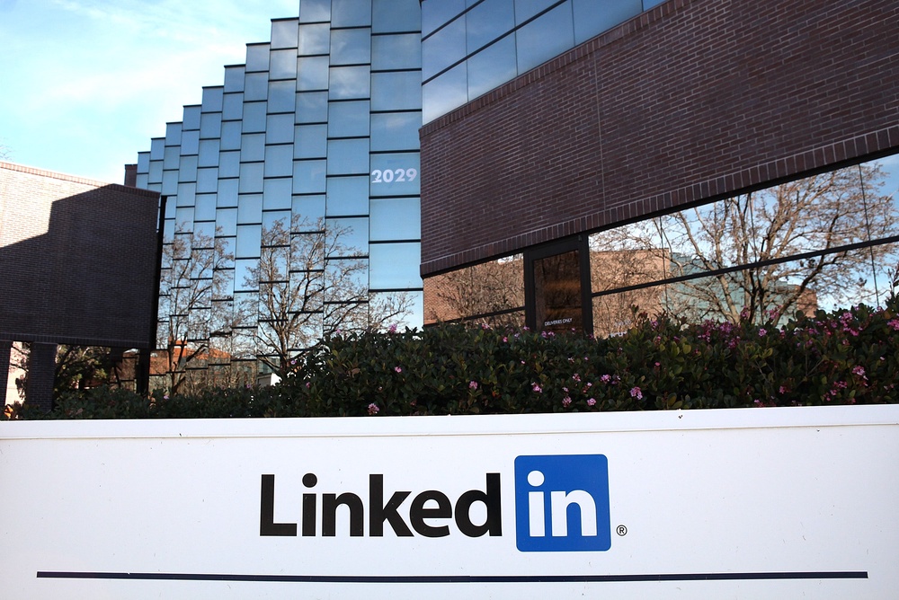 The layoffs are not a result of LinkedIn looking to replace human workers with AI systems, the sources said (Getty)