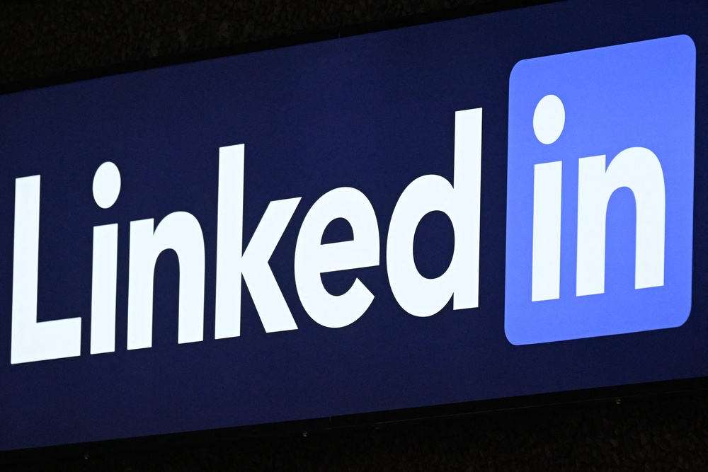 LinkedIn announced it is testing a new button users can select to flag posts they suspect are AI-generated (AFP/Getty)