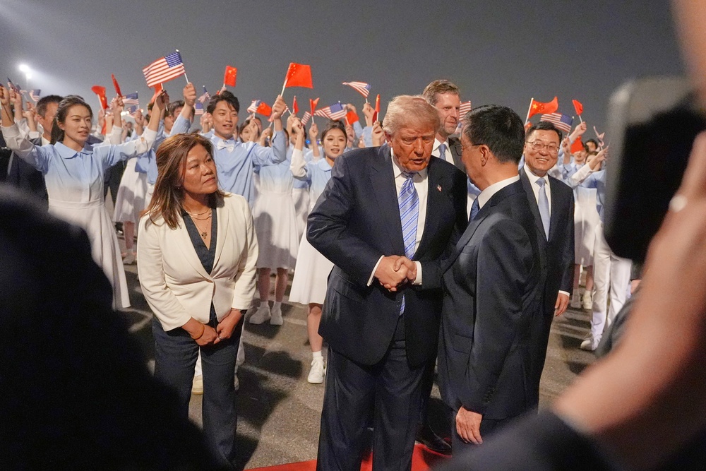 U.S. President Donald Trump arrived in Beijing Wednesday with a warm welcome (AP)