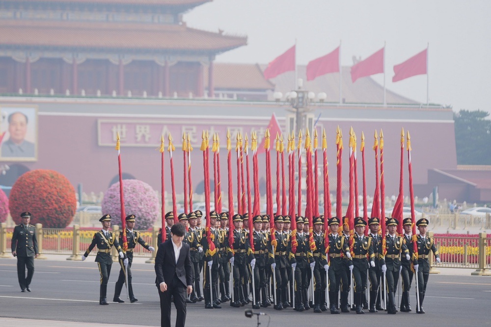 Members of the military rehearse before President Donald Trump is greeted by Chinese President Xi Jinping at a welcome ceremony at the Great Hall of the People, Thursday (AP)