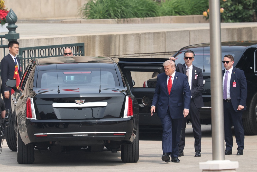 U.S. President Donald Trump arrives during a welcome ceremony at the Great Hall of the People (Reuters)