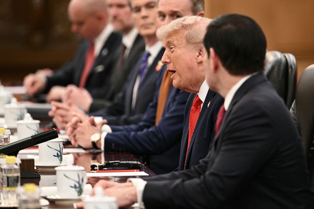 US President Donald Trump (C) speaks next to Secretary of State Marco Rubio (R) during a meeting with China's President Xi Jinping at the Great Hall of the People in Beijing (AFP/Getty)
