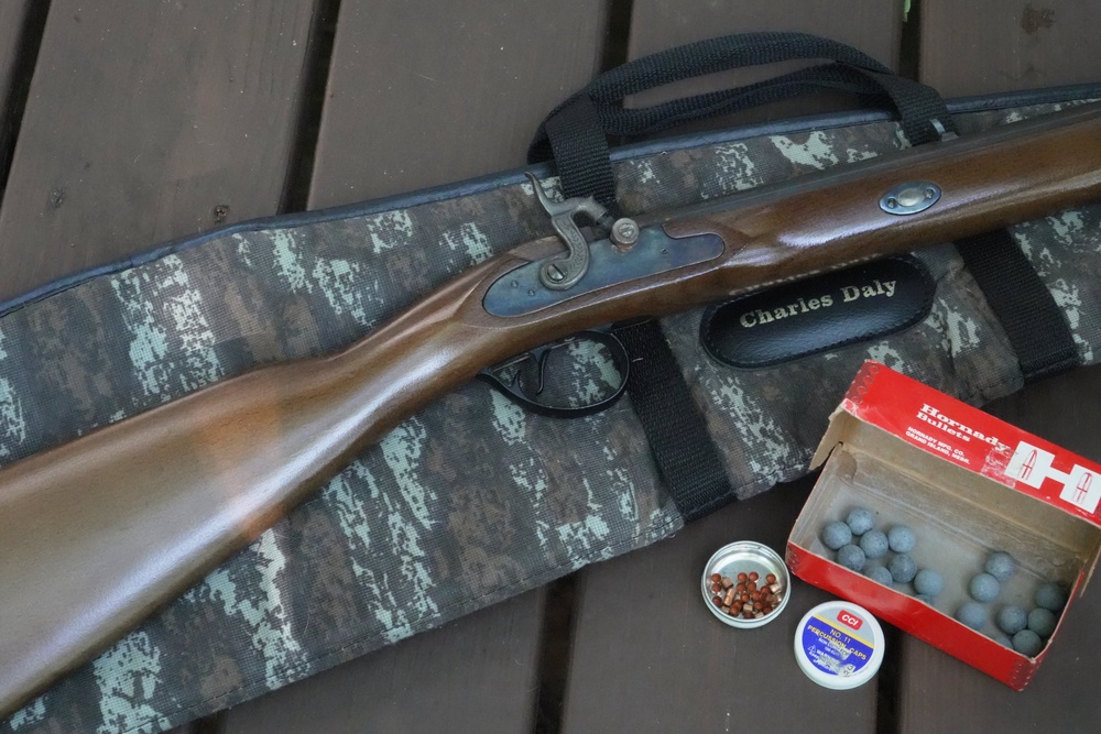 A .50-caliber Hawken replica rifle with lead balls and percussion caps sits on a deck in Wake Forest, N.C., on Monday, May 4, 2026. (AP Photo/Allen G. Breed) (Copyright 2026 The Associated Press. All rights reserved)