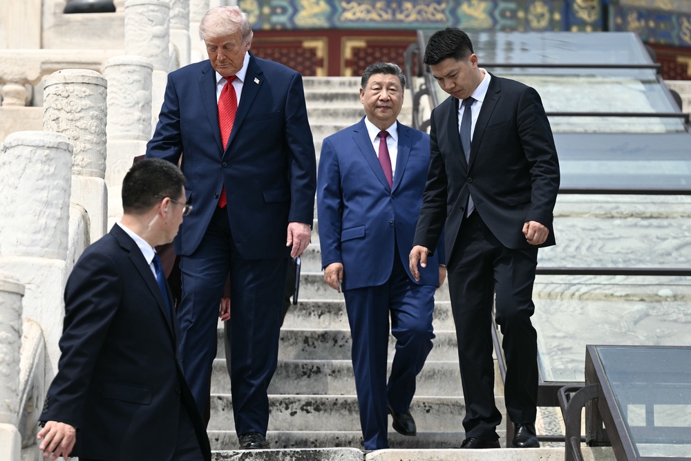 China's President Xi Jinping (2nd R) and US President Donald Trump (2nd L) visit the Temple of Heaven on May 14 (Getty)
