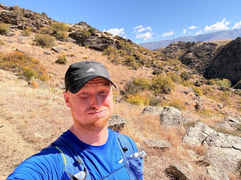Views? Good. Legs? Touch and go: Harry suffering on the trail (Harry Bullmore/The Independent)