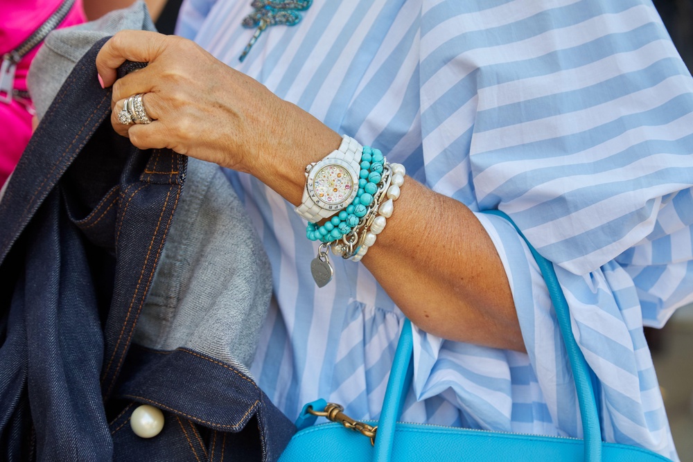 Layered bracelets can offer intrigue and meaning to an outfit (Alamy/PA)