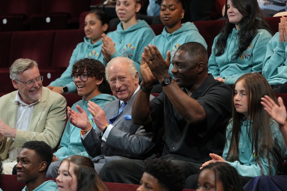Charles and Sir Idris enjoyed a performance during their visit (Kin Cheung/PA) (PA Wire)