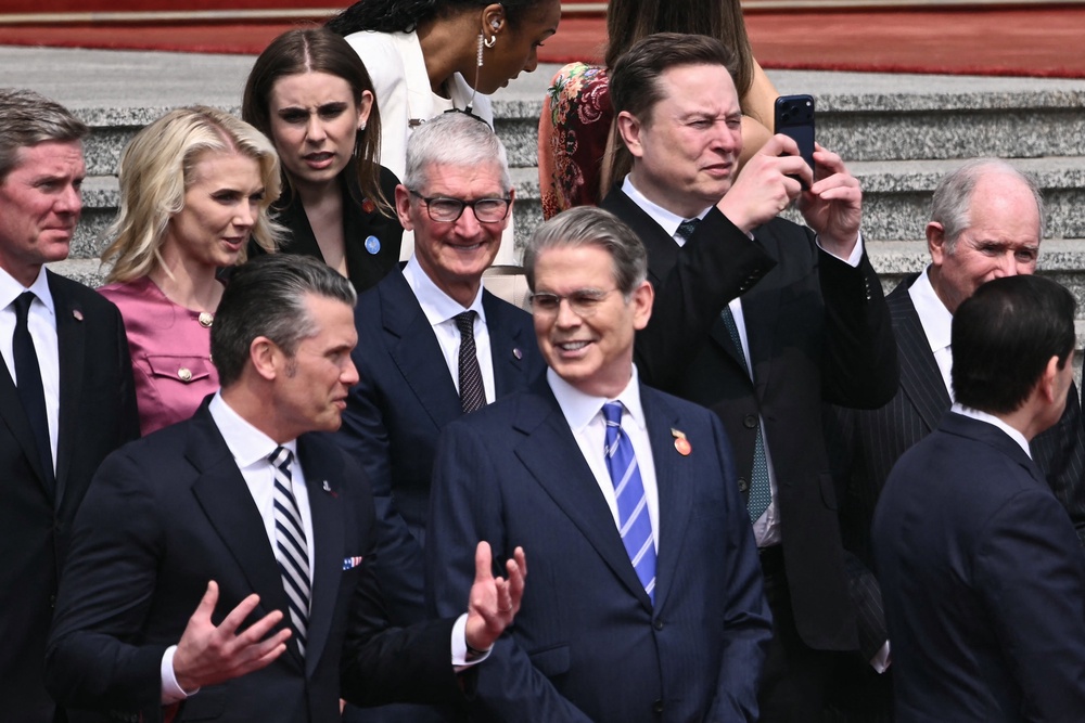 Tim Cook, Elon Musk and Jensen Huang were among the billionaire CEOs who accompanied Trump on his trip to China (AFP via Getty Images)