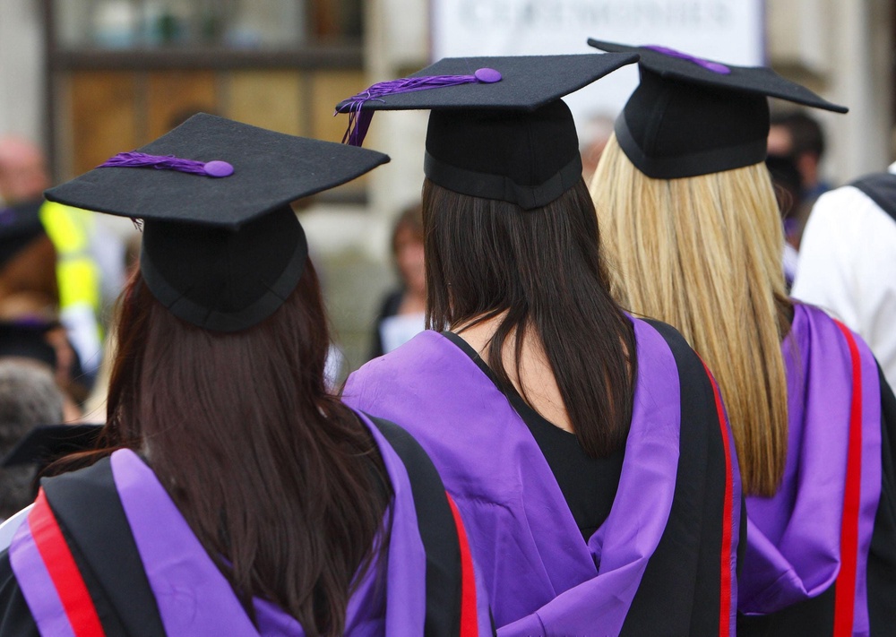 From next year, graduates will pay back 9% of everything they earn above £29,385 until 2030. (PA)