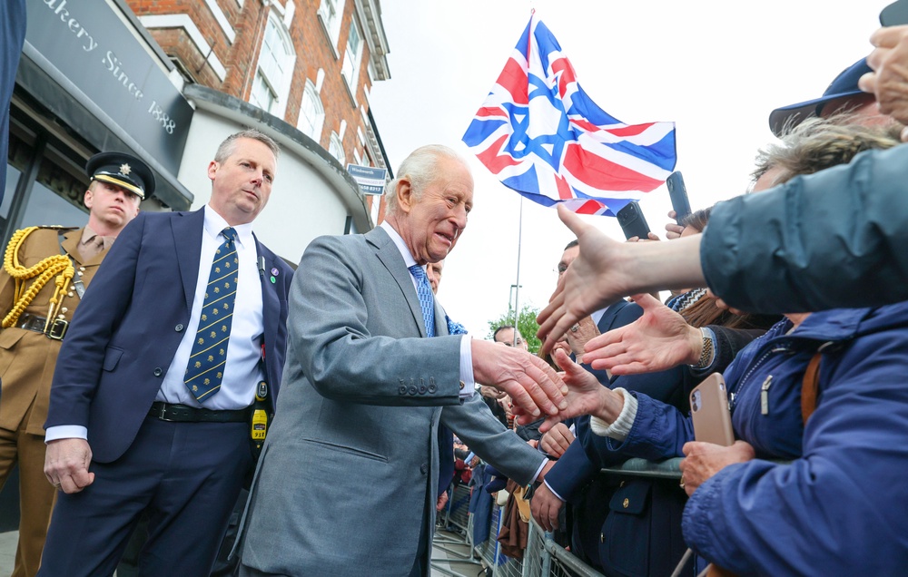 Charles greeted the crowds gathered to welcome him (Richard Pohle/The Times/PA) (PA Wire)