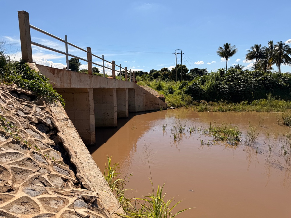 Cracks are visible in the base of a bridge built just two years ago by the government, which are the result of the river expanding unexpectedly due to repeated heavy rainfall (Nick Ferris)
