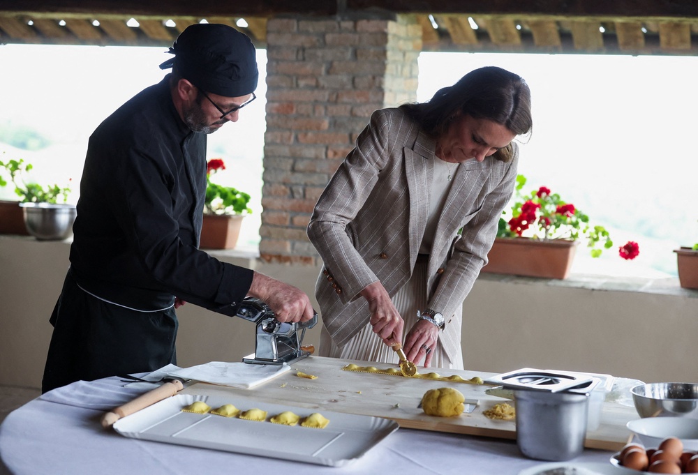 The Princess of Wales helps prepare lunch at rural Agriturismo ‘Al Vigneto’ in Reggio Emilia ((Phil Noble/PA))