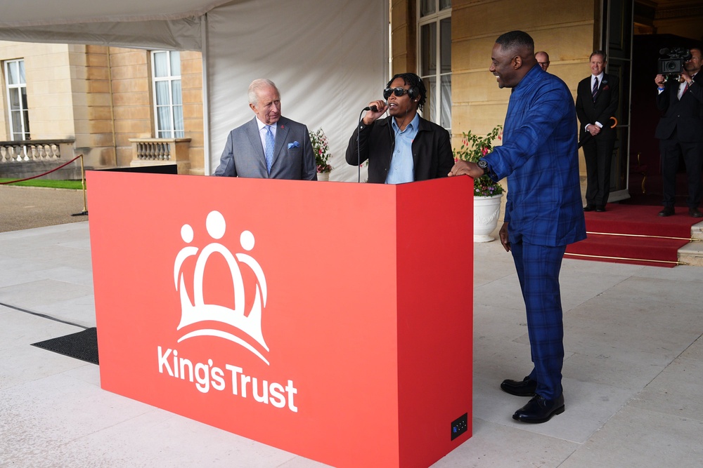 Charles with Christian St Louis and Sir Idris Elba (Aaron Chown/PA) (PA Wire)
