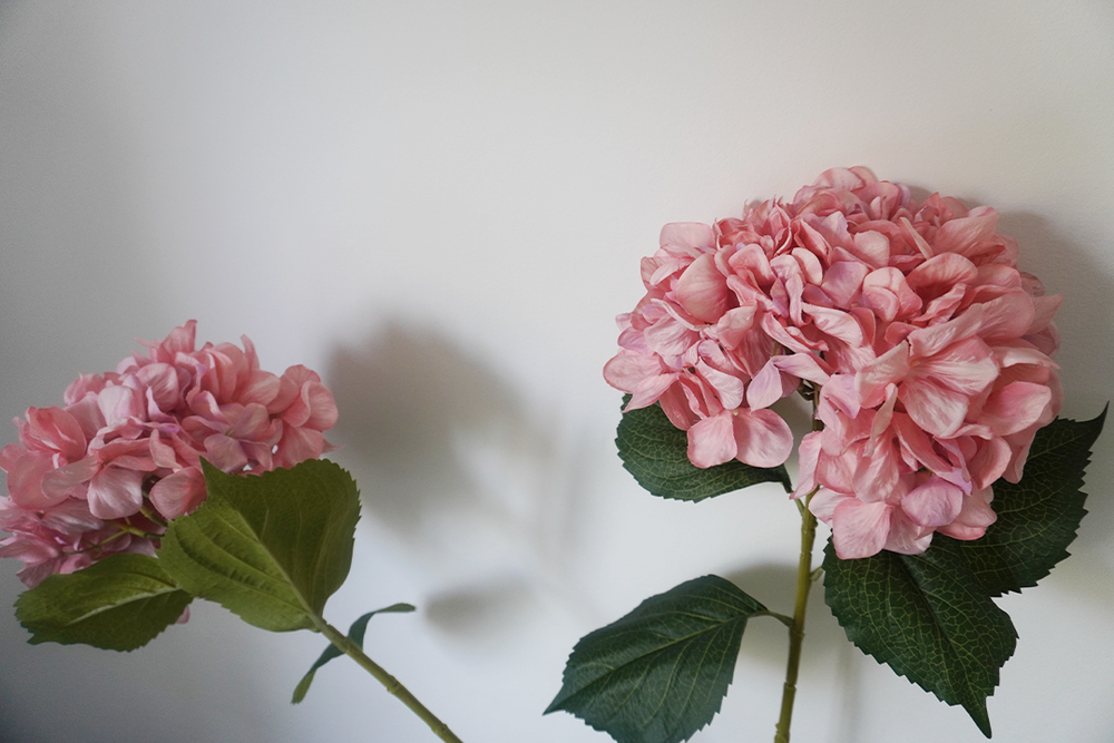 You may need to trim the stems to get these faux blooms to fit neatly in a vase (Eve Smallman/The Independent)