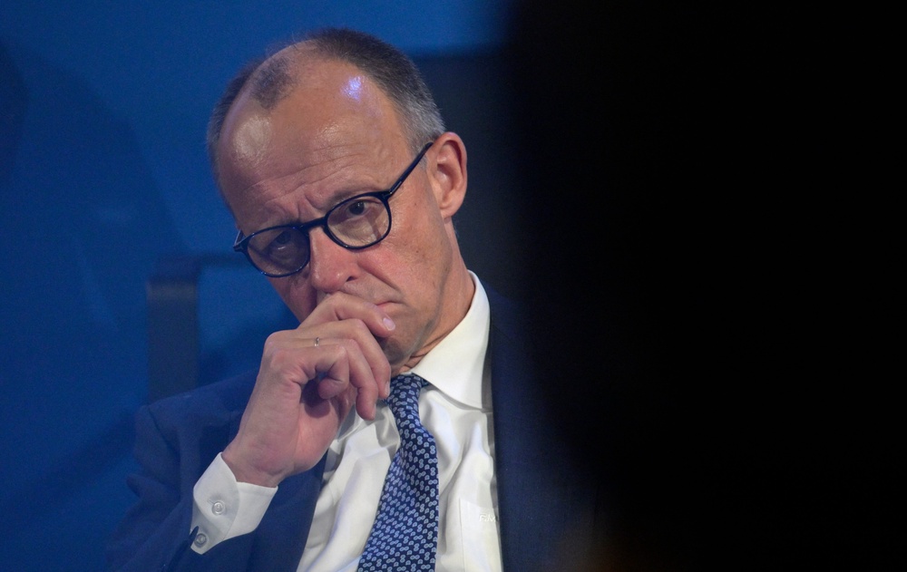 German chancellor Friedrich Merz listens to speeches in Aachen, western Germany (AFP/Getty)