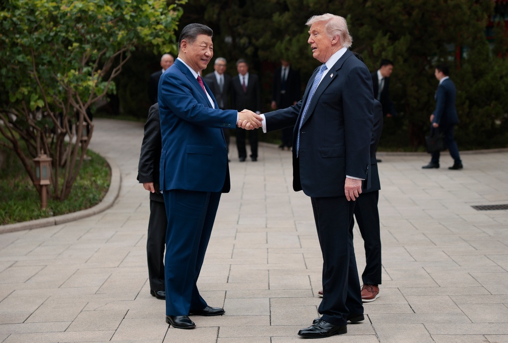 Trump and Xi shake hands (Getty)
